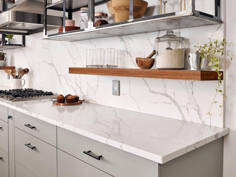 kitchen with light colored quartz countertops and backsplashes