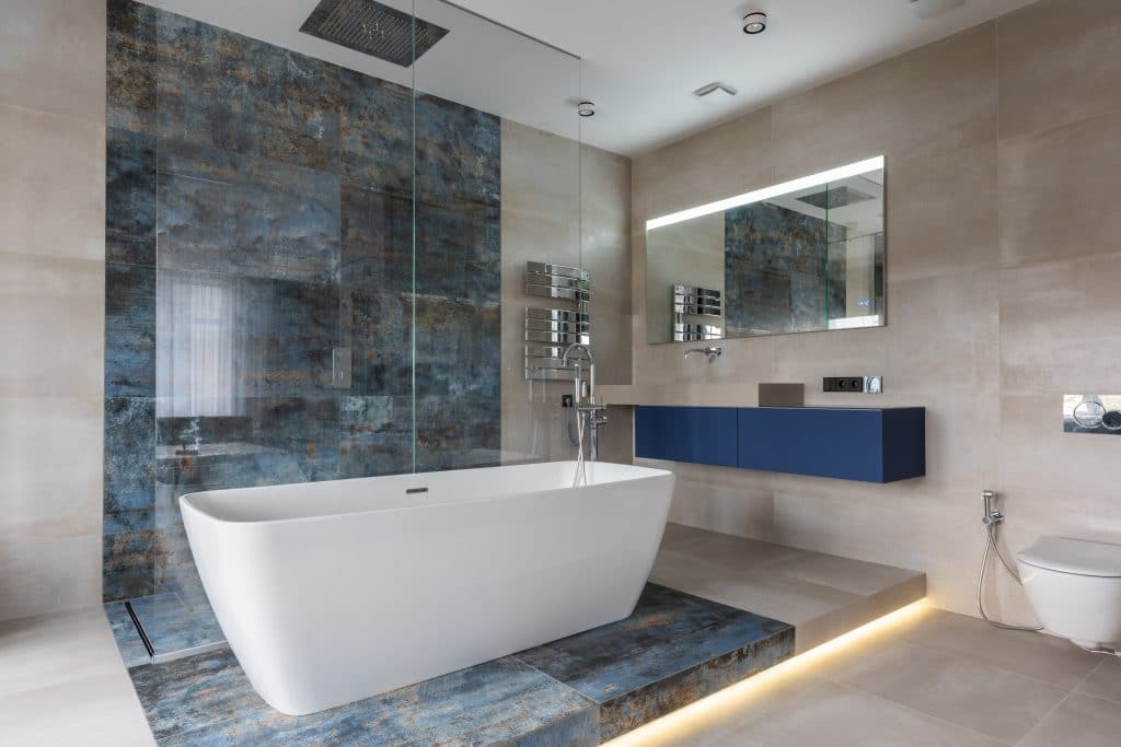 Modern bathroom interior with freestanding tub