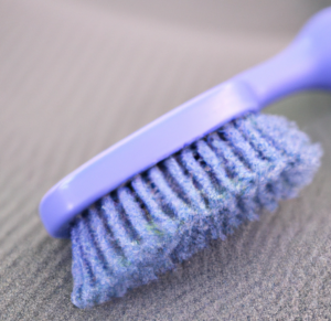 small brush to dust off any dirt on fabric