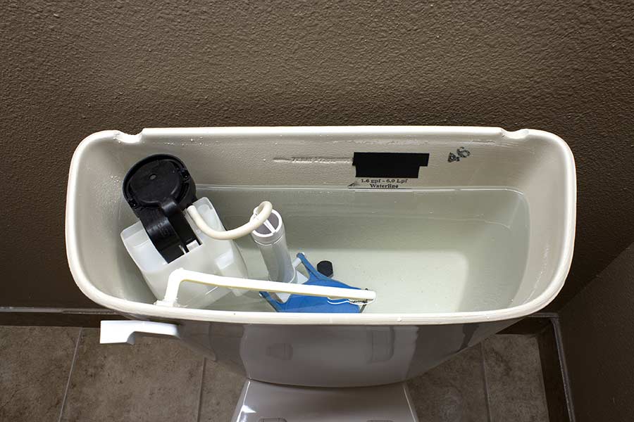 stop toilet from running when flushing