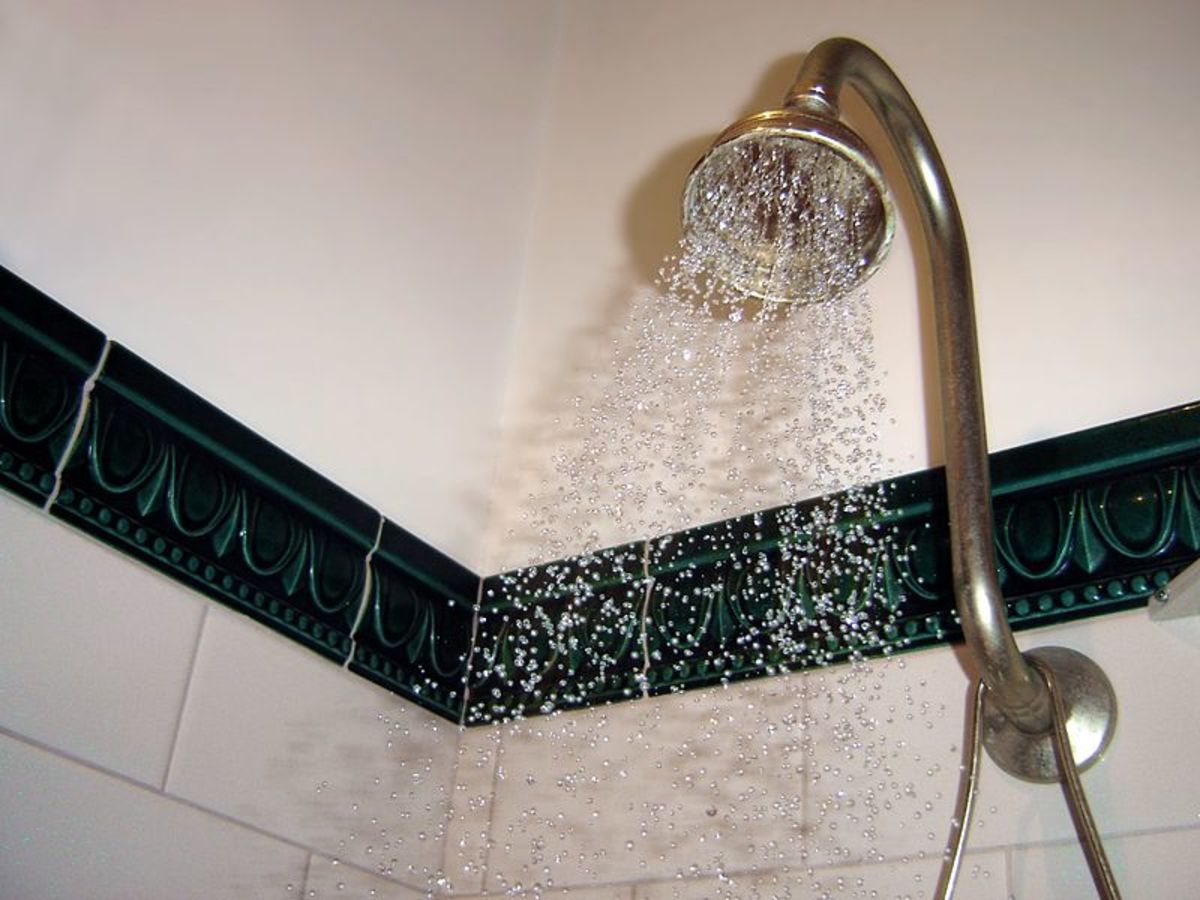 How Can I Lower My Handheld Shower Head?