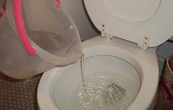 To flush toilet when lever is broken