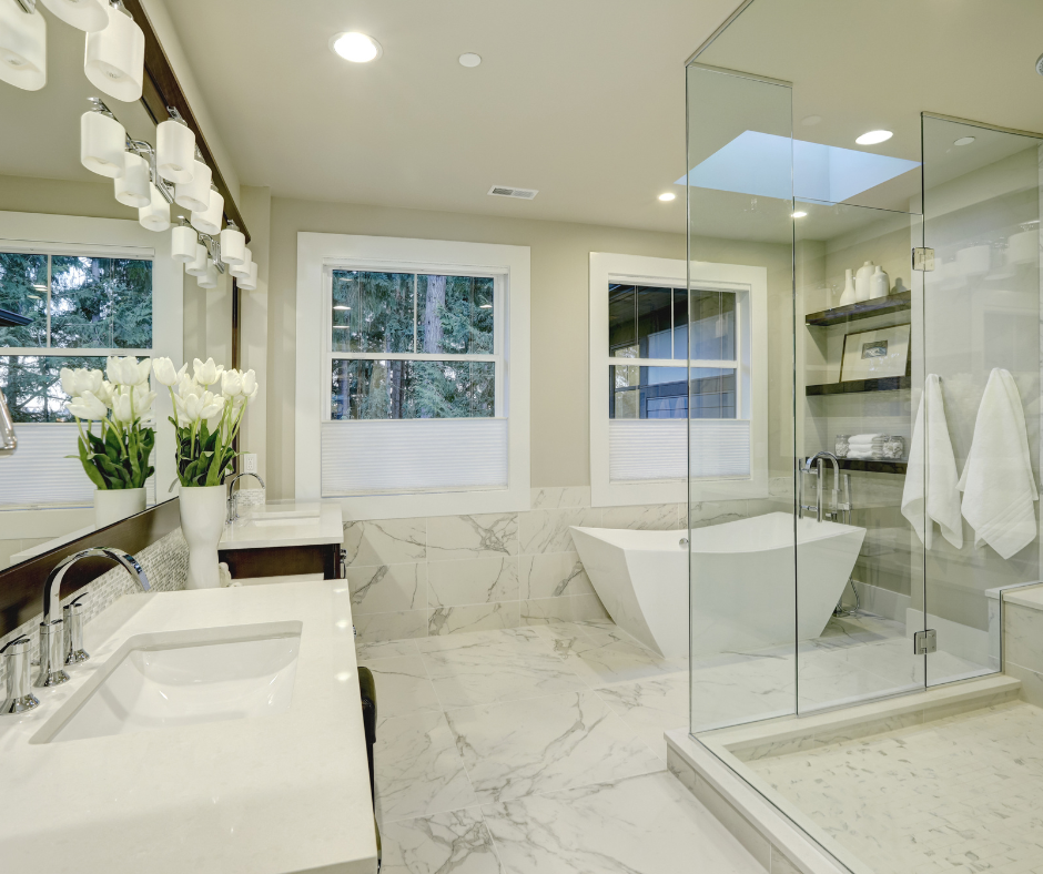 A frameless glass enclosure in a modern walk in shower