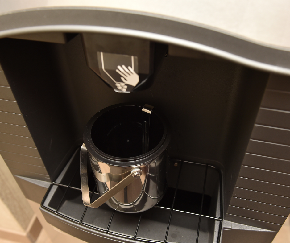 A close-up image of the Opal ice maker with a red light indicating opal ice maker not making ice issue during the cleaning process.