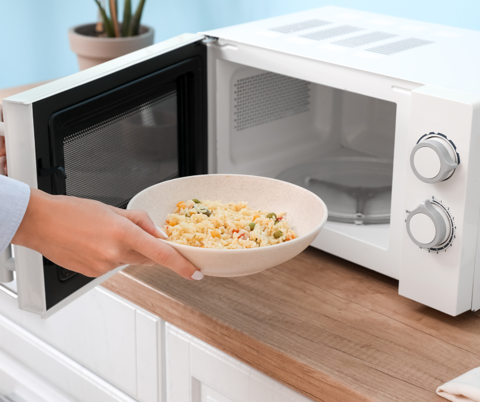 A convection microwave oven with a combination cooking mode and a metal rack