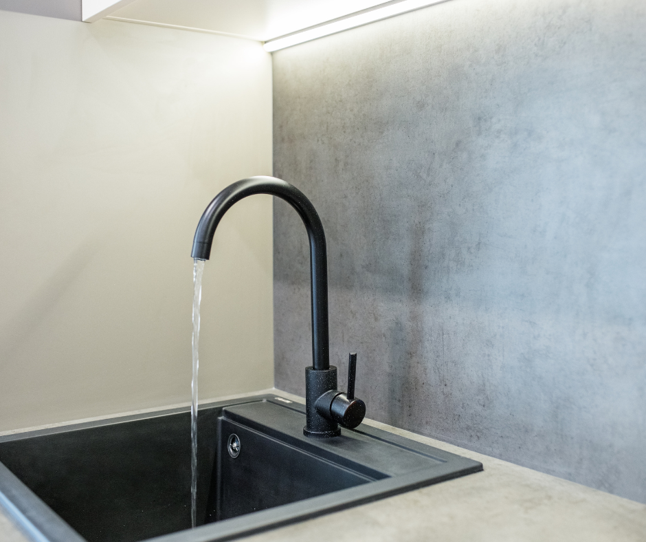A kitchen faucet with different materials and finishes