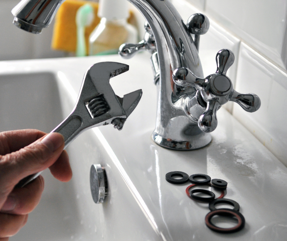 An image of a Moen kitchen faucet being tested for leaks after repair due to leaking kitchen faucet moen issue.