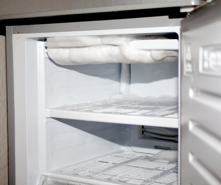 An image showing the inside of a Maytag freezer with a malfunctioning ice maker, causing Maytag ice maker not working. Regular cleaning and defrosting can help prevent this issue.