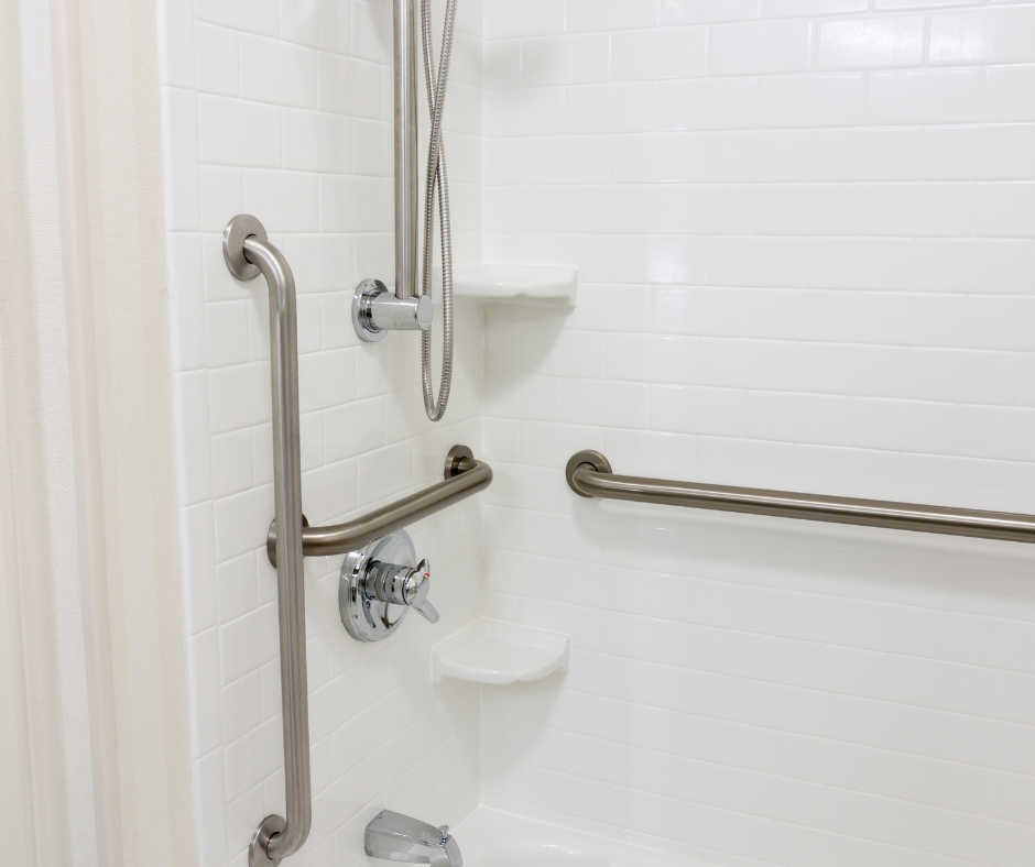 An image of a bathroom with a shower bench and grab bars, providing shower bench ideas for a safe and comfortable shower experience.